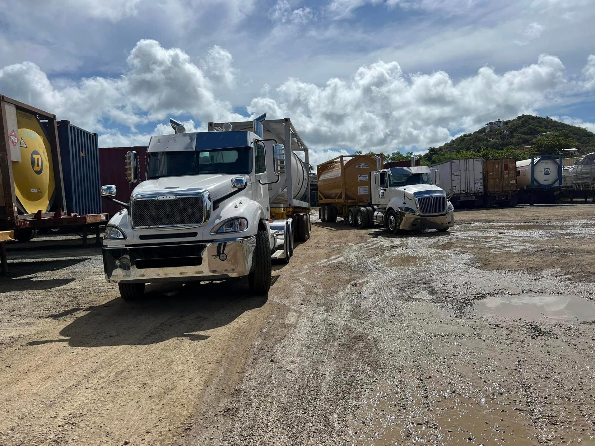 B&B Trucking fleet with tank containers at yard